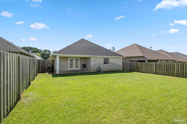 5726 Dunridge Dr, Pace, FL 32571 - rear view of property with french doors, brick siding, and a shingled roof