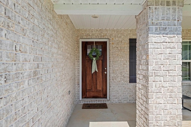 5726 Dunridge Dr, Pace, FL 32571 - doorway to property featuring brick siding