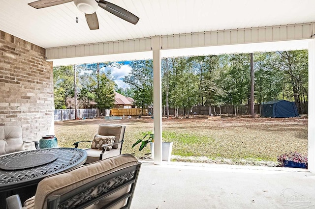 view of patio / terrace featuring ceiling fan