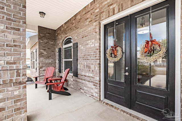 entrance to property featuring french doors