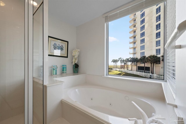 bathroom with independent shower and bath