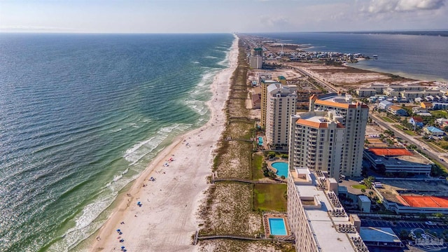 bird's eye view with a beach view and a water view