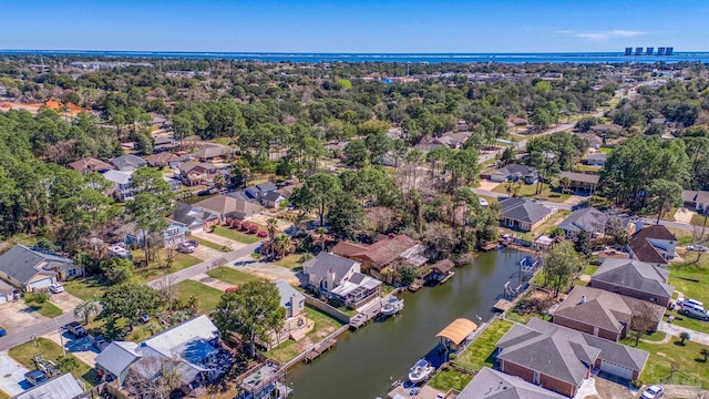 aerial view with a water view and a residential view