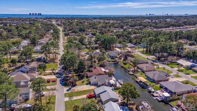 aerial view with a water view and a residential view