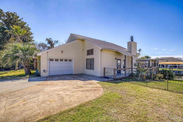 view of property exterior featuring driveway, a lawn, a chimney, an attached garage, and fence