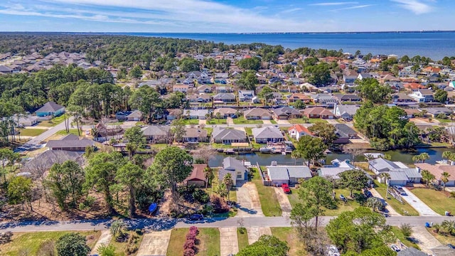 aerial view with a residential view and a water view