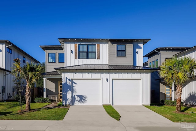 view of front facade featuring a front yard and a garage