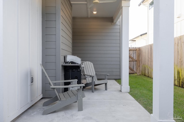 view of patio featuring ceiling fan and grilling area