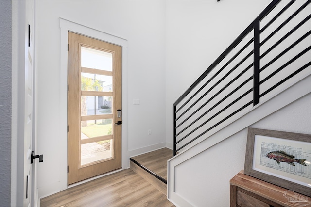 entrance foyer with light hardwood / wood-style floors