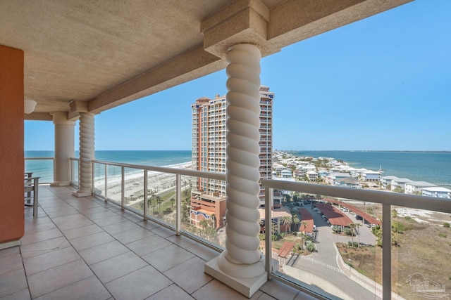 balcony featuring a water view