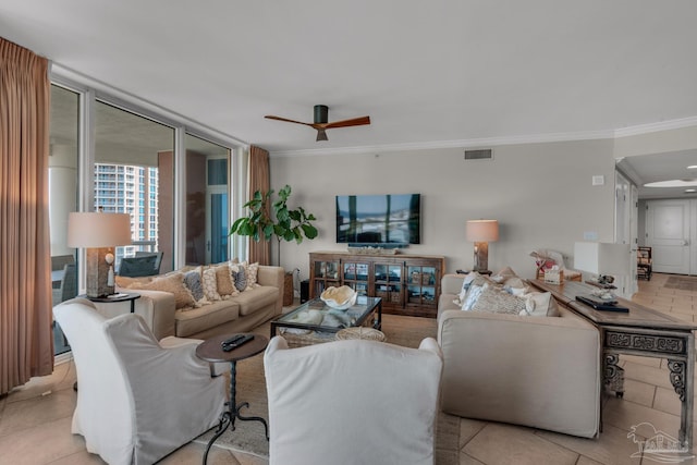 tiled living room featuring crown molding and ceiling fan