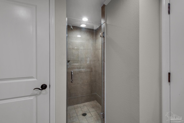 bathroom featuring an enclosed shower