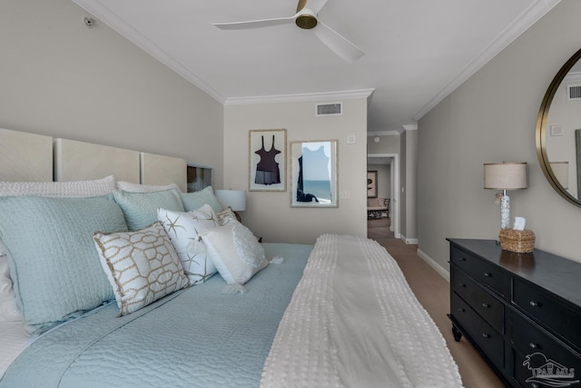 carpeted bedroom featuring crown molding and ceiling fan