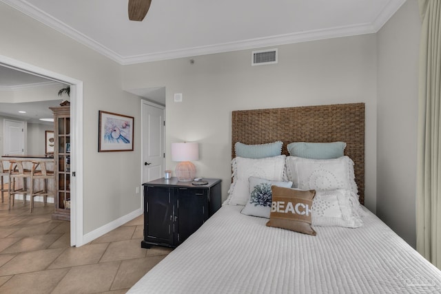 bedroom featuring light tile patterned flooring, ceiling fan, and ornamental molding