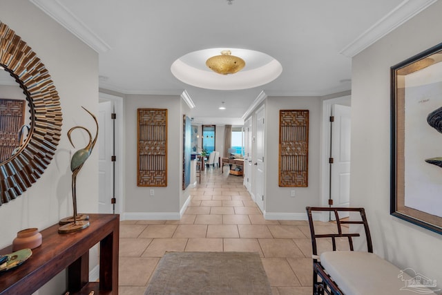 corridor with light tile patterned floors and ornamental molding