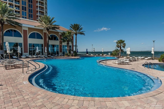 view of pool featuring a patio area