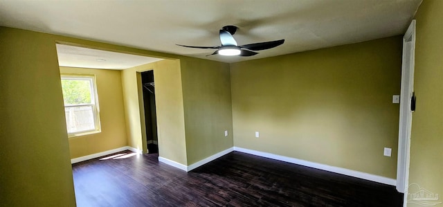 607 Hannah St, Pensacola, FL 32534 - unfurnished room featuring baseboards, a ceiling fan, and dark wood-style floors