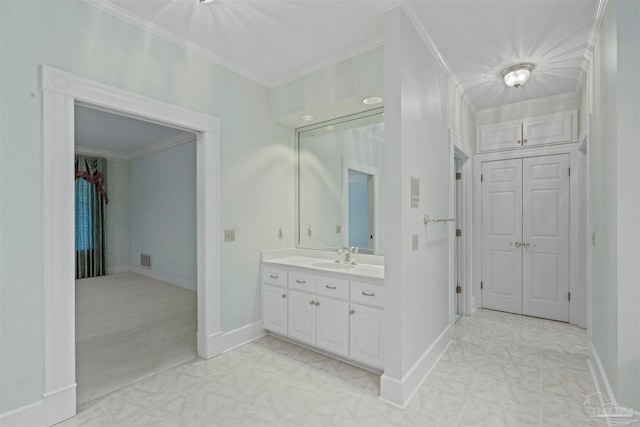 bathroom featuring vanity and crown molding