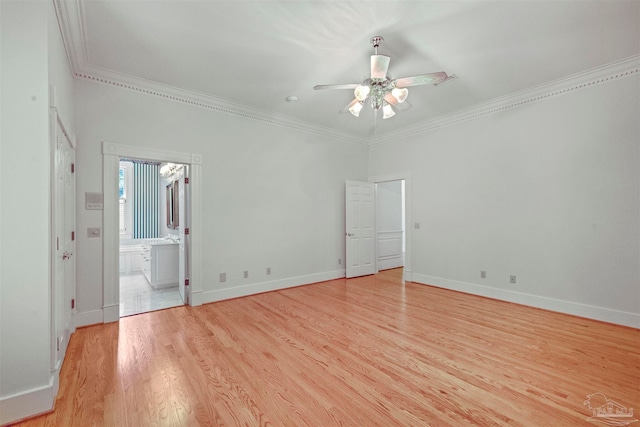 empty room with light wood-type flooring, ceiling fan, and crown molding