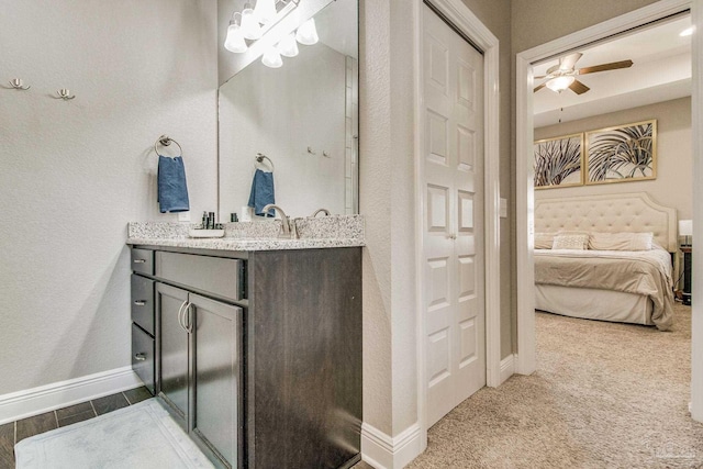 bathroom with vanity and ceiling fan