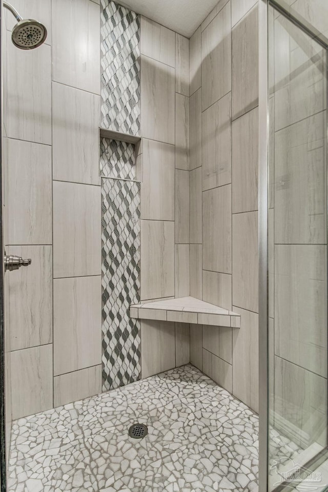 bathroom with an enclosed shower