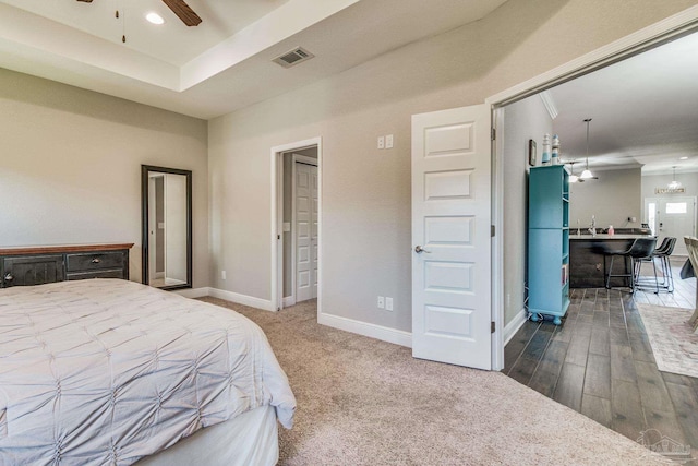 bedroom featuring ceiling fan and hardwood / wood-style flooring