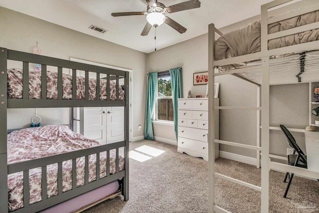 bedroom featuring ceiling fan and carpet floors