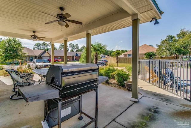 view of patio featuring ceiling fan and grilling area