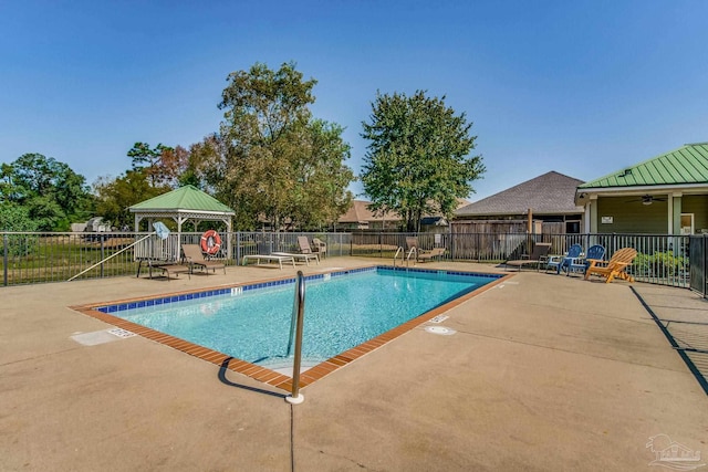 view of pool featuring a patio and a gazebo