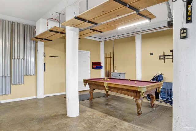 playroom with concrete floors and pool table