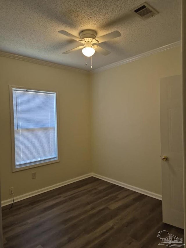 2008 Augusta Ave, Pensacola, FL 32507 - spare room with a textured ceiling, dark wood-style floors, ornamental molding, ceiling fan, and baseboards