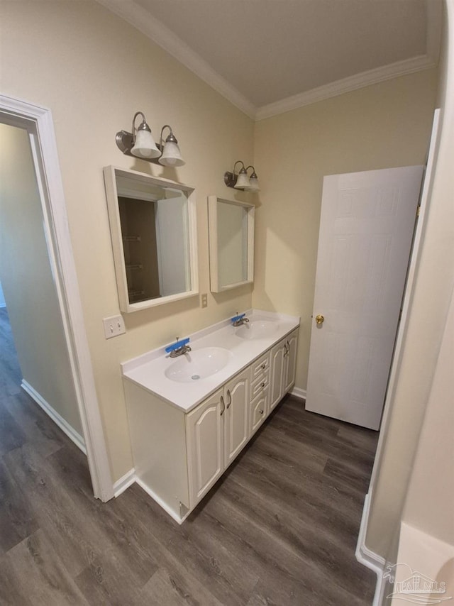 2008 Augusta Ave, Pensacola, FL 32507 - full bathroom featuring ornamental molding, wood finished floors, double vanity, and baseboards