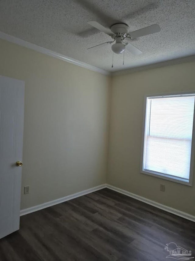 2008 Augusta Ave, Pensacola, FL 32507 - unfurnished room featuring dark wood finished floors, a ceiling fan, a textured ceiling, baseboards, and ornamental molding