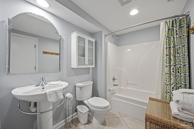 full bathroom with baseboards, visible vents, tile patterned flooring, toilet, and shower / tub combo with curtain