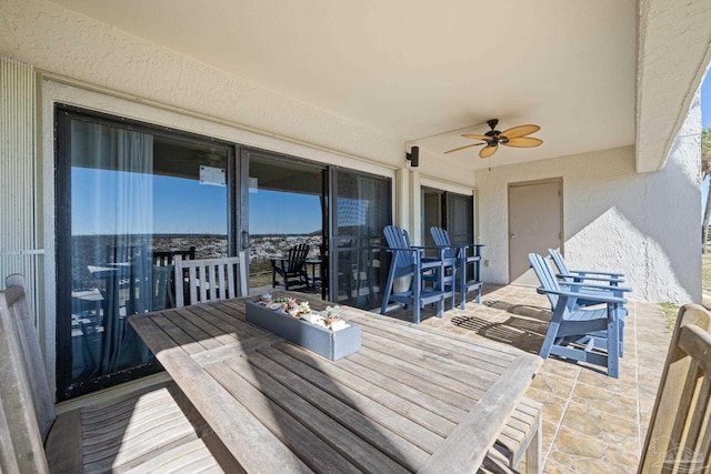 wooden terrace with ceiling fan