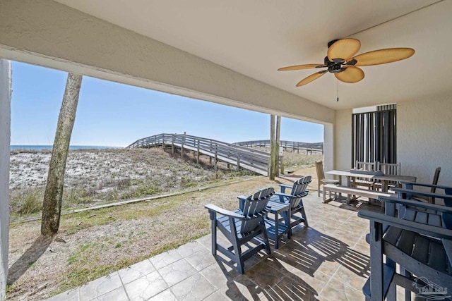 view of patio featuring a ceiling fan