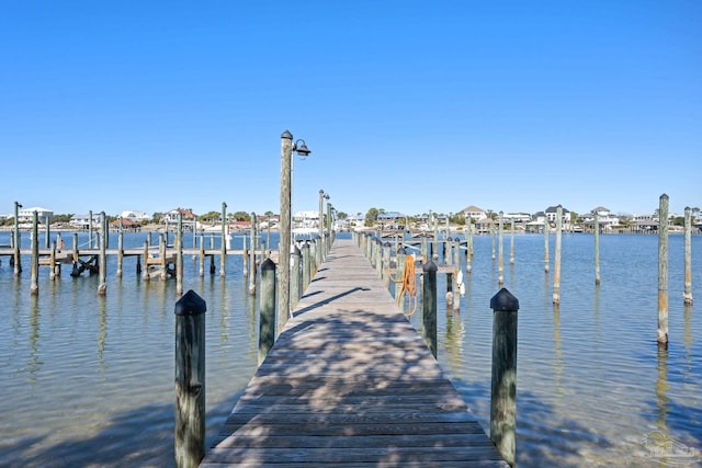 view of dock with a water view