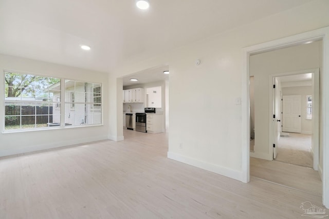 4514 Florelle Way, Pensacola, FL 32505 - unfurnished living room with light wood-style flooring, baseboards, and recessed lighting