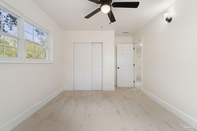 4514 Florelle Way, Pensacola, FL 32505 - unfurnished bedroom featuring baseboards, carpet floors, ceiling fan, visible vents, and a closet