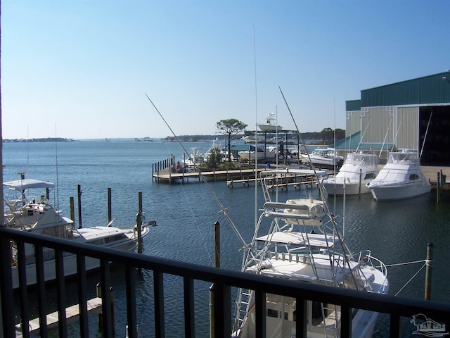 property view of water featuring a boat dock