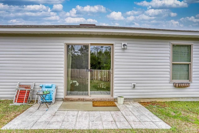 doorway to property featuring a patio