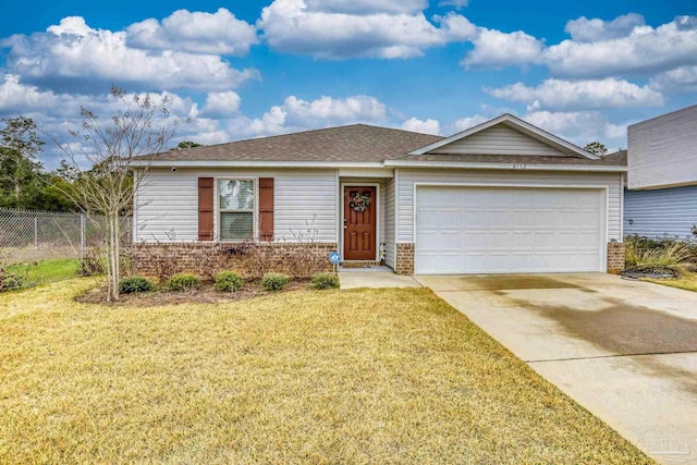 ranch-style home with a garage, fence, a front lawn, and concrete driveway