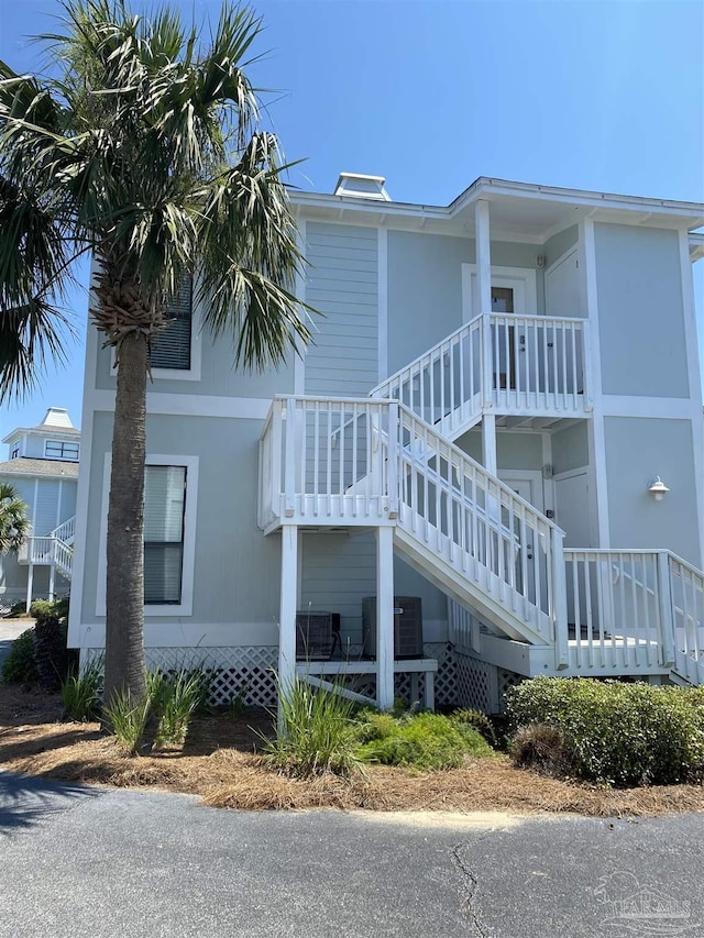 view of home's exterior featuring central AC unit