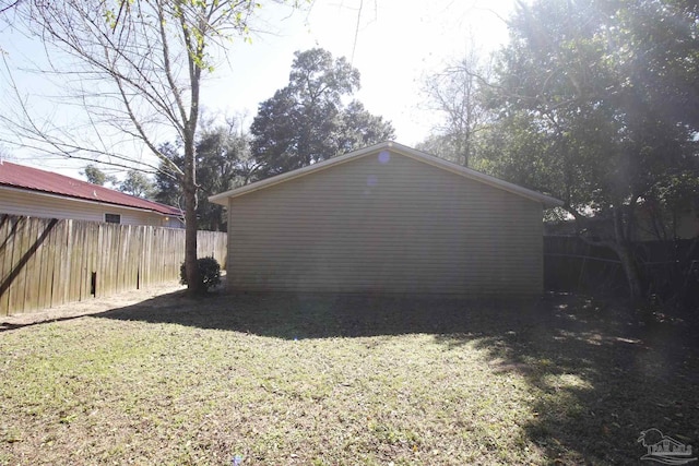 view of property exterior with a lawn