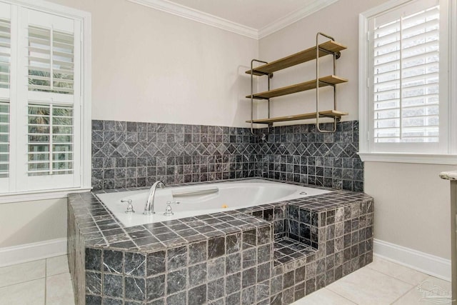 bathroom featuring plenty of natural light, ornamental molding, tile patterned flooring, and tiled tub