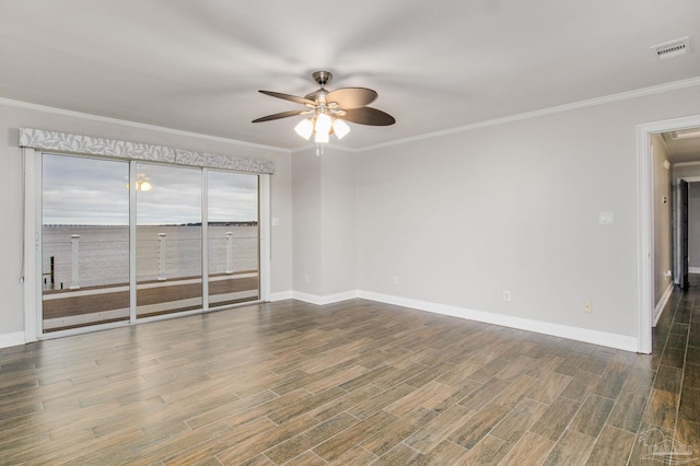 empty room with ornamental molding and ceiling fan