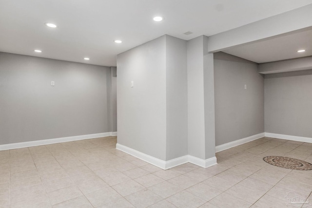 basement with light tile patterned floors