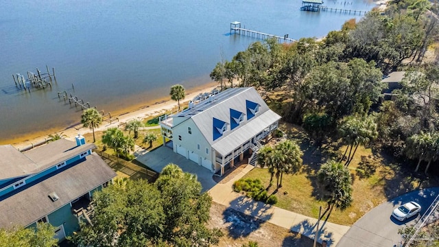 drone / aerial view with a water view