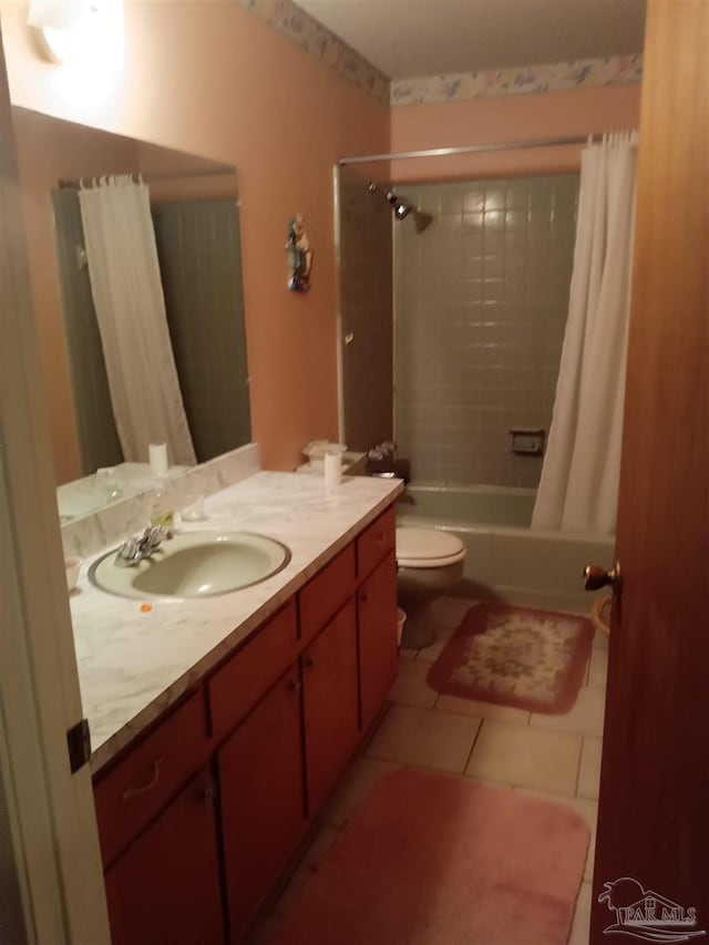 4801 Berryhill Rd, Milton, FL 32570 - full bath with tile patterned floors, shower / tub combo with curtain, vanity, and toilet