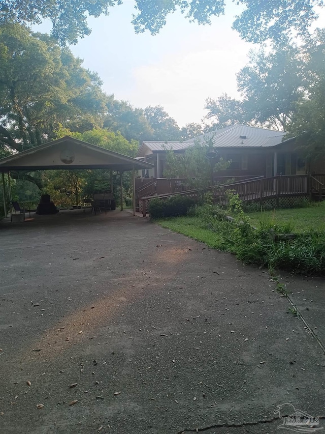 4801 Berryhill Rd, Milton, FL 32570 - exterior space with a carport and aphalt driveway